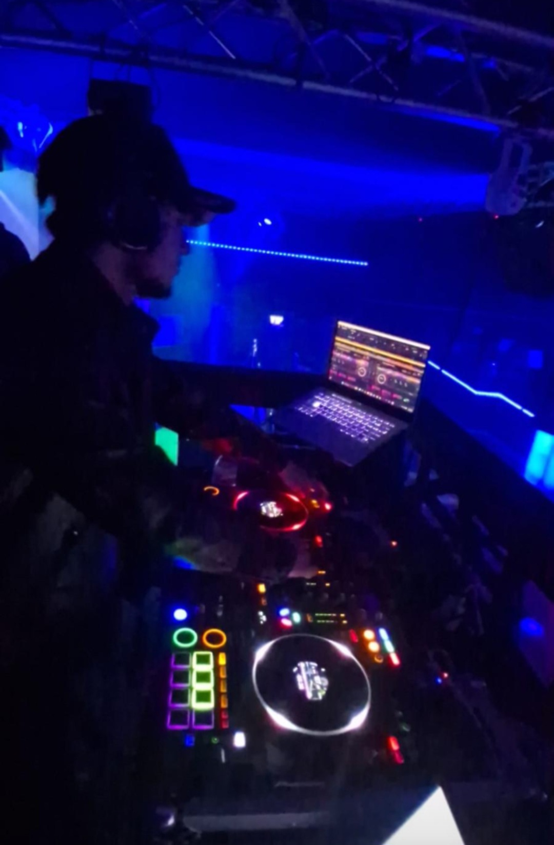 College event DJ setup with club lighting