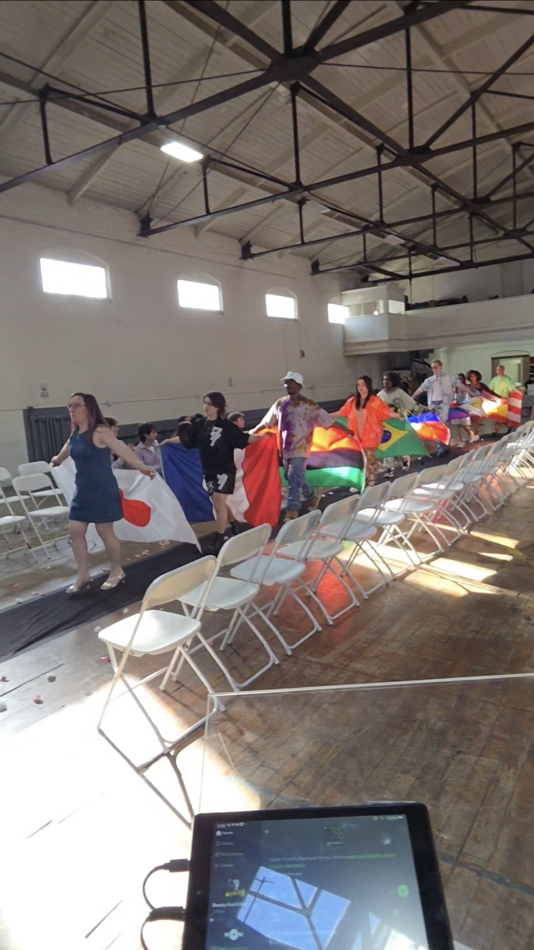 Community event gathering inside a warehouse-style event space